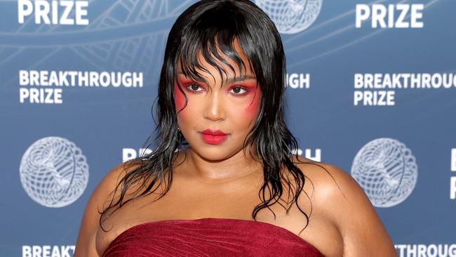 Lizzo has reportedly pushed those closest to her away as she battles to become a “barbie”. Picture: Getty.