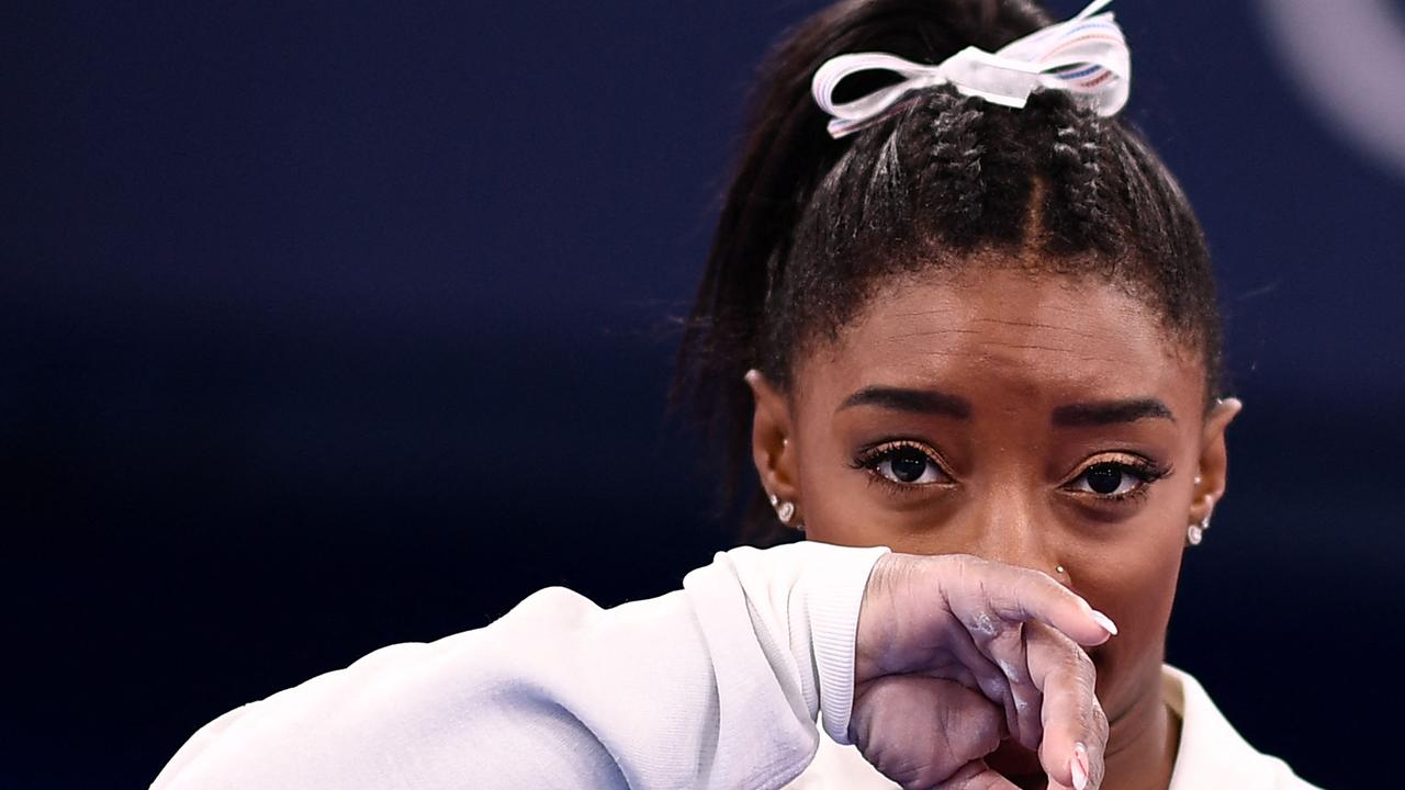 A dejected Simone Biles after she pulled out of the teams competition in Tokyo. Picture: AFP