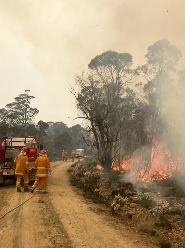 Firefighters at work battling blazes in Tasmania's Central Highlands near Miena. Picture: TARA FELTS