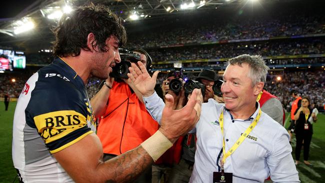 Johnathan Thurston and Paul Green after winning the 2015 NRL Grand Final. Picture: Adam Head