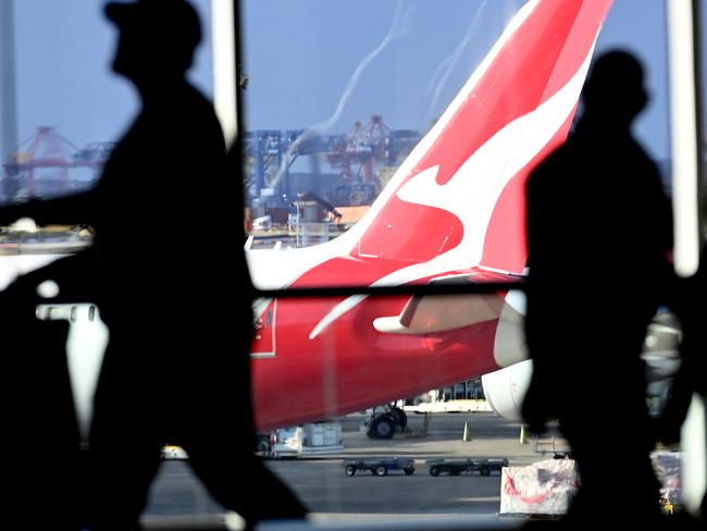 SYDNEY, AUSTRALIA - NewsWire Photos JULY 29, 2022: General scenes of a Qantas plane at the arrival gate at SydneyÃs International AirportPicture: NCA NewsWire / Jeremy Piper