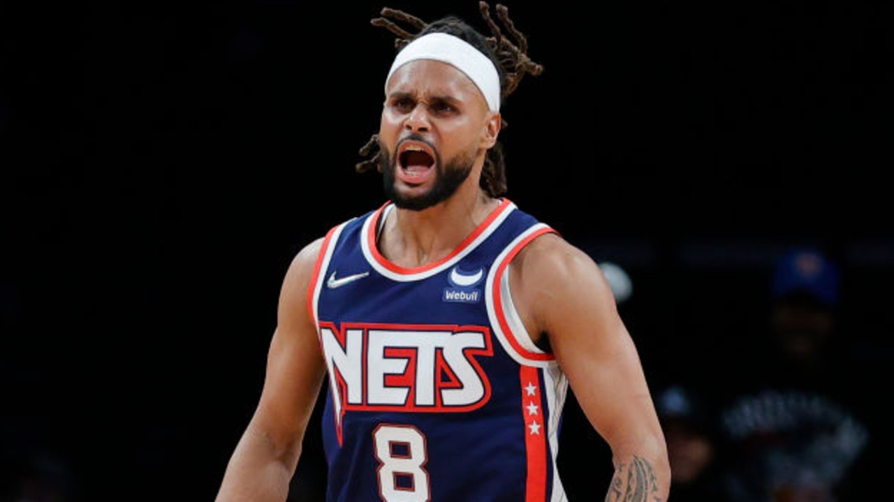 NEW YORK, NEW YORK - NOVEMBER 03: Patty Mills #8 of the Brooklyn Nets reacts during the second half against the Atlanta Hawks at Barclays Center on November 03, 2021 in the Brooklyn borough of New York City. NOTE TO USER: User expressly acknowledges and agrees that, by downloading and or using this photograph, user is consenting to the terms and conditions of the Getty Images License Agreement. (Photo by Sarah Stier/Getty Images)