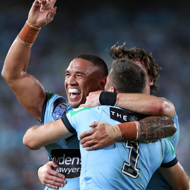 James Tedesco, Tyson Frizell and Clinton Gutherson celebrate a try for NSW.