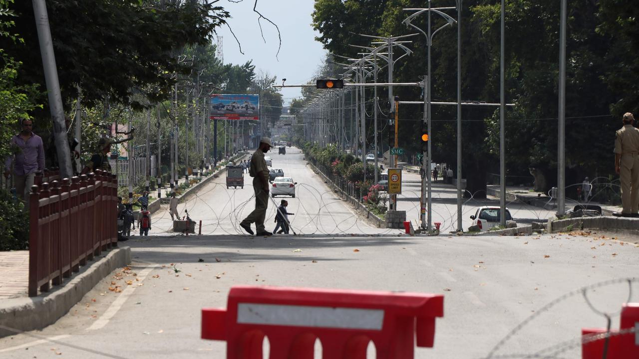 Indian security personnel patrolling on a street in Srinagar, as widespread restrictions on movement and a telecommunications blackout remained in place after the Indian government stripped Jammu and Kashmir of its autonomy. Picture: Saqib MUGLOO / AFP.