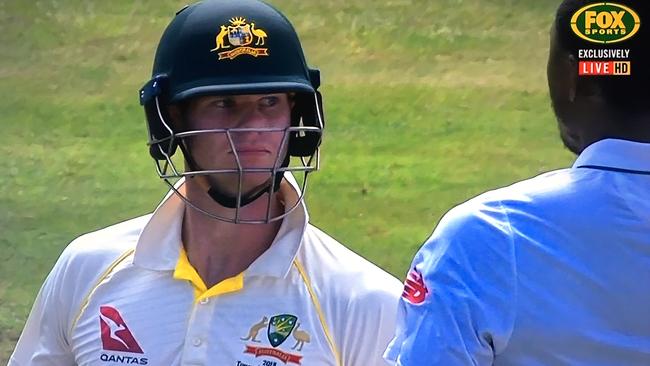 Australian captain Steve Smith clashes with South African fast bowler Kagiso Rabada after being dismissed in the first innings of the Second Test. Photo: Fox Sports