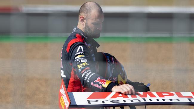 Van Gisbergen surveys his damaged Camaro. Picture: Matthew Paul