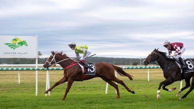 Lockyer Valley Turf Club Gatton Cup day, race two Lexington Lad (trianed by Adam Simpson and Dallas Urand, ridden by Zac Lloyd). Saturday, June 26, 2021. PHOTO: Ali Kuchel