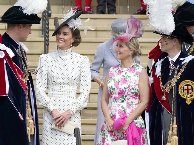 The Prince and Princess of Wales talk with the Duke and Duchess of Edinburgh after the service. Picture: AFP