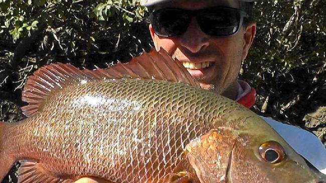 Andy Thomsen catches a 48cm Mangrove Jack. Picture: Contributed