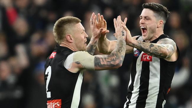 Jordan De Goey and Jack Crisp will be desperate to ensure the Pies don’t slide down the ladder. Picture: Quinn Rooney/Getty Images.