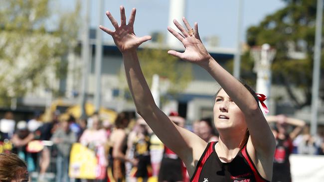 Cassidy Moore reaches for the ball during the C Grade grand final between Newtown &amp; Chilwell and St Joseph’s. Picture: Alison Wynd