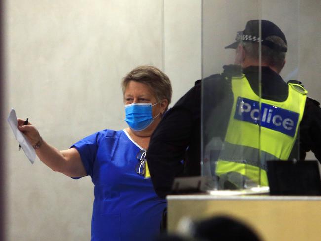 01/10/20 Police and medical staff in the new hotel quarantine at the Novotel in Southbank.. Aaron Francis/The Australian