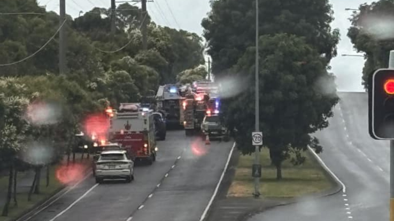 Paramedics rushed to the serious single-vehicle crash at the intersection of Manly Road and Wondall Road at 3:45pm, with crews working to free a man from the vehicle. Picture: Courty Nish