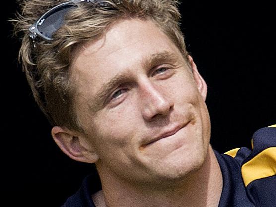 Scott Selwood of the West Coast Eagles high fives fans during an Eagles Welcome Home function at Domain Stadium, Subiaco on 4 October 2015