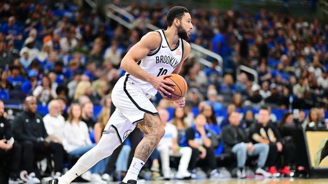 ORLANDO, FLORIDA - OCTOBER 25: Ben Simmons #10 of the Brooklyn Nets dribbles the ball in the second half of a game against the Orlando Magic at Kia Center on October 25, 2024 in Orlando, Florida. NOTE TO USER: User expressly acknowledges and agrees that, by downloading and or using this photograph, User is consenting to the terms and conditions of the Getty Images License Agreement. Julio Aguilar/Getty Images/AFP (Photo by Julio Aguilar / GETTY IMAGES NORTH AMERICA / Getty Images via AFP)