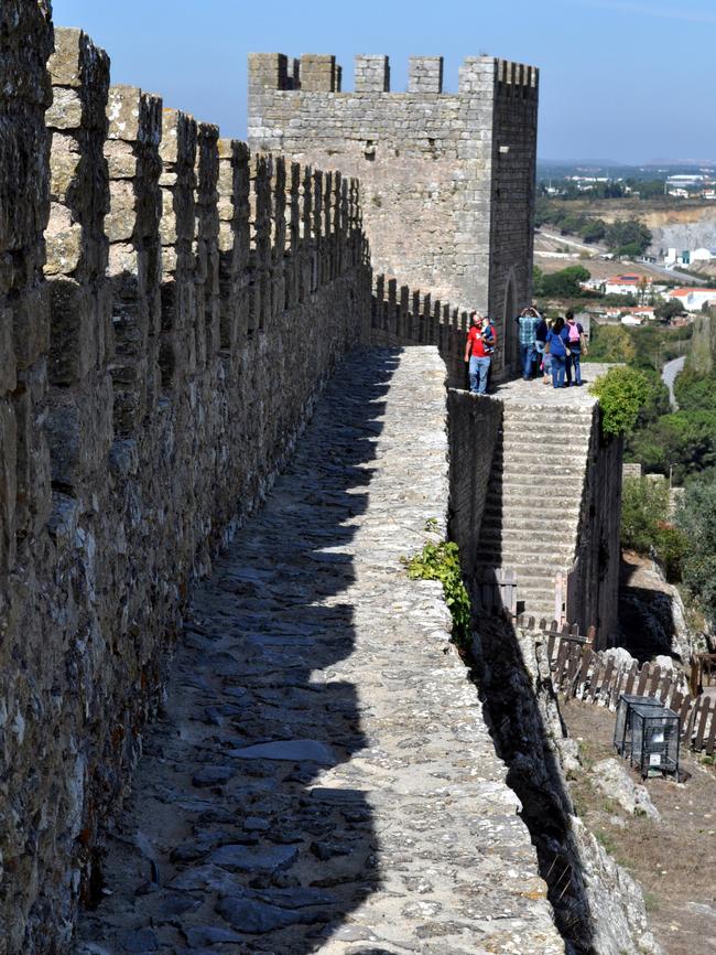 Walking the old city wall of Obidos, Portugal. Photo: Graham Stephenson