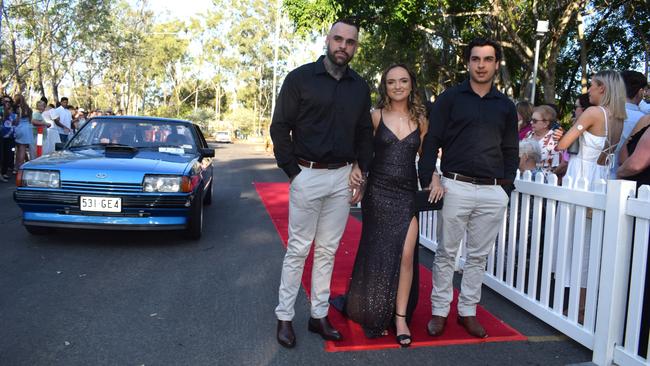 Frankie Lennox with Michael and Tristin Hagenbach at the North Rockhampton High School Formal 2023.