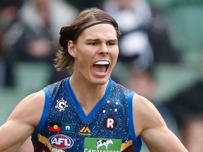 MELBOURNE, AUSTRALIA - MAY 28: Eric Hipwood of the Lions celebrates a goal with teammates during the 2017 AFL round 10 match between the Collingwood Magpies and the Brisbane Lions at the Melbourne Cricket Ground on May 28, 2017 in Melbourne, Australia. (Photo by Adam Trafford/AFL Media/Getty Images)