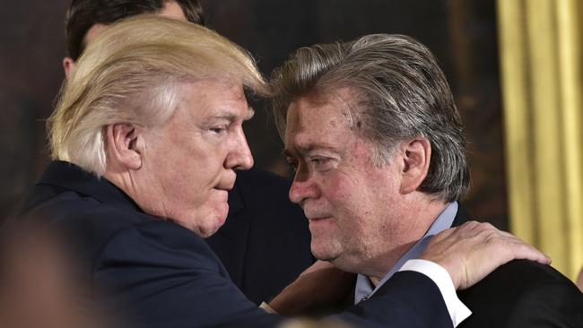 US President Donald Trump and senior adviser Stephen Bannon, who has just been booted off the Security Council. Picture: AFP