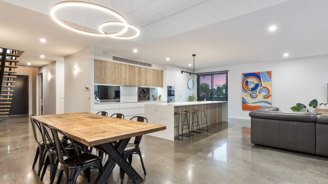 Polished concrete floors and halo feature lights impress inside.