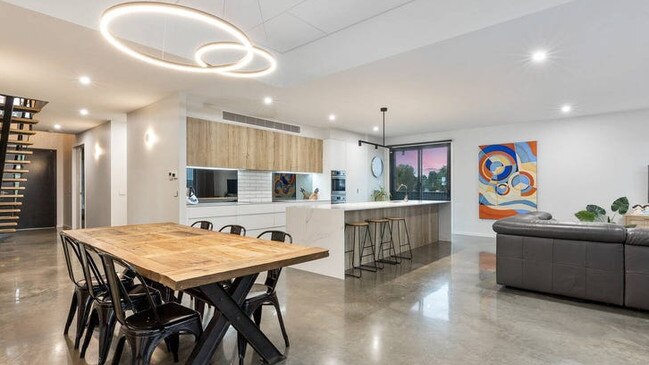 Polished concrete floors and halo feature lights impress inside.