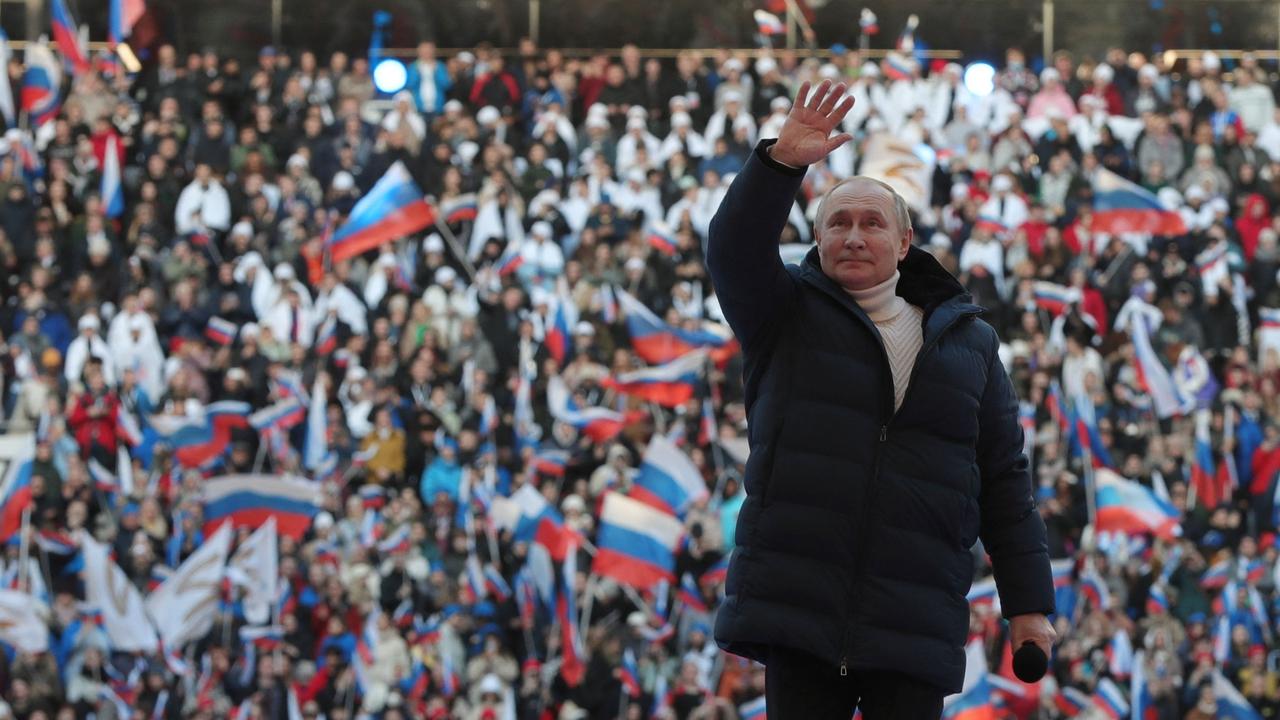 Russian President Vladimir Putin attends a concert marking the eighth anniversary of Russia's annexation of Crimea. Picture: AFP.