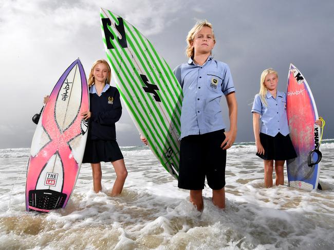 Amelia Craike, Luca Martin and Maddison Kenchington Inaugural Australian Interschool Surfing Competition. Friday May 17, 2024. Picture, John Gass