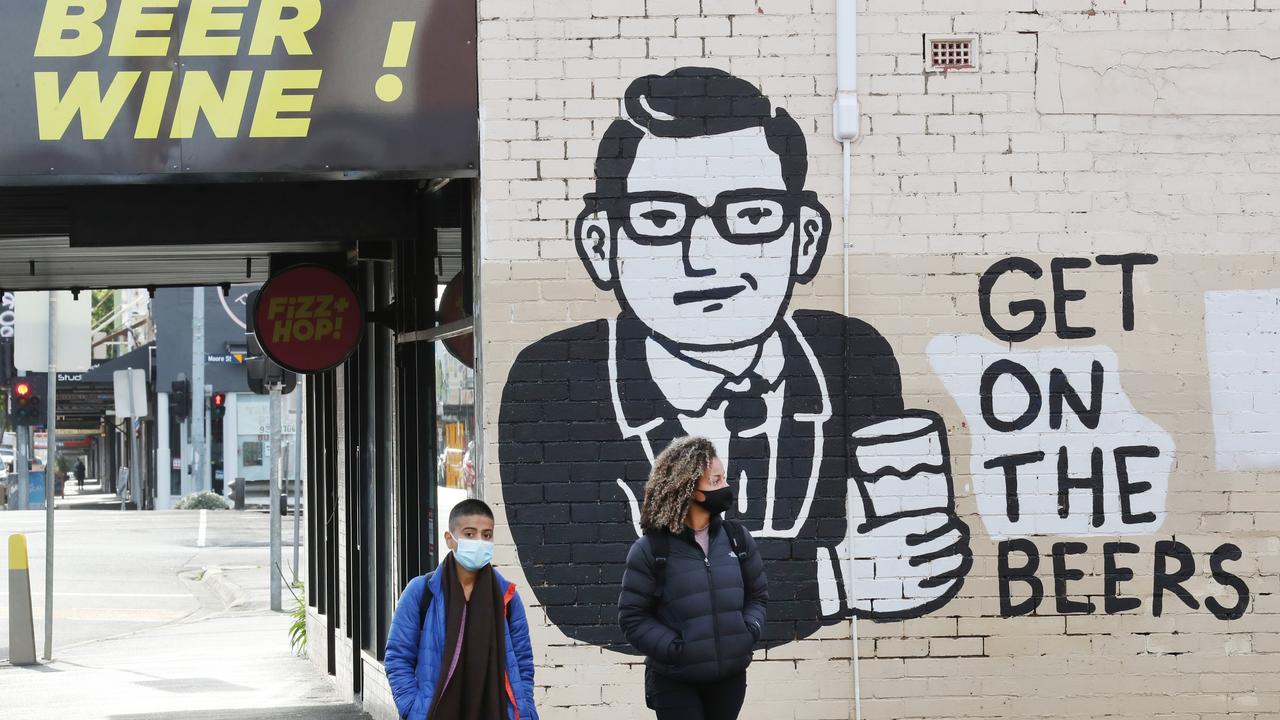 A mural of Premier Daniel Andres on shop in Moonee Ponds as Melbourne begins to reopen after a long COVID lockdown. Picture: NCA NewsWire/ David Crosling