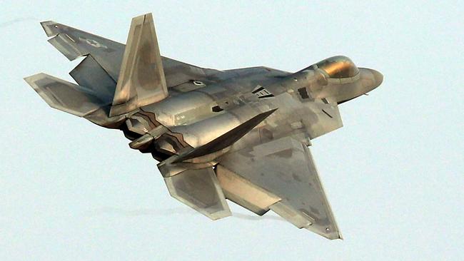 A US air force F-22 Raptor stealth jet flies over a South Korean air base in Gwangju. Picture: Yonhap via AFP.