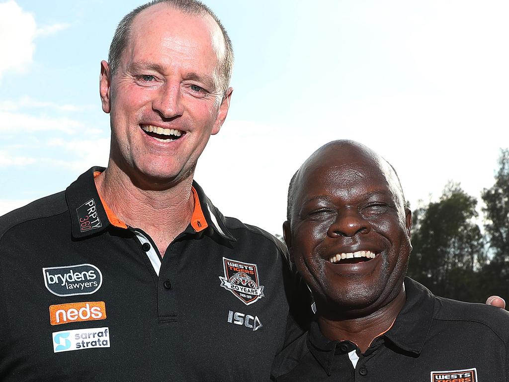 Wests Tigers Head Coach Michael Maguire with Super Dube, whom Maguire met in Zimbabwe during his humanitarian visit to the country in 2017 Ñ allowing him to see firsthand the impact that the humanitarian aid programs have, at St Lukes Park, Concord. Picture: Brett Costello