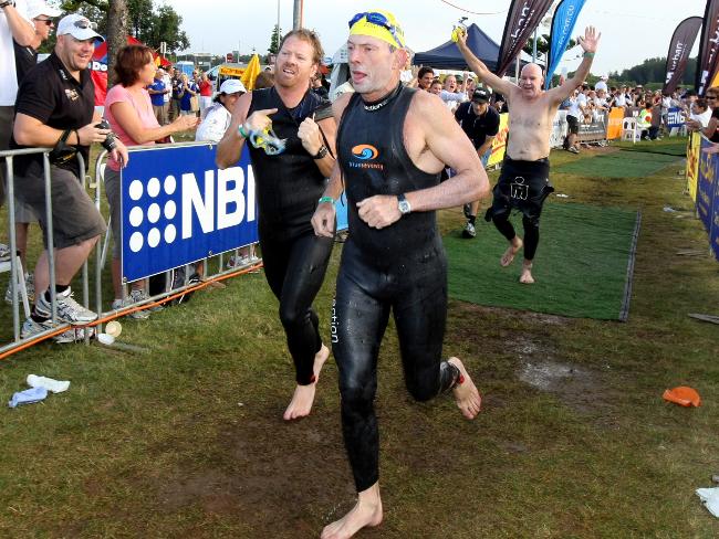 <p>Tony Abbott after the swim leg of an Ironman in Port Macquarie. Picture: Nathan Edwards</p>