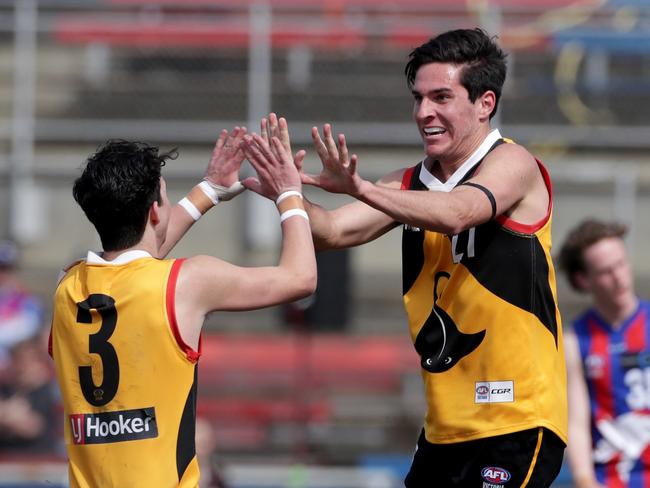 Lachlan McDonnell celebrates a goal during the TAC Cup Grand Final between the Dandenong Stingrays and the Oakleigh Chargers.