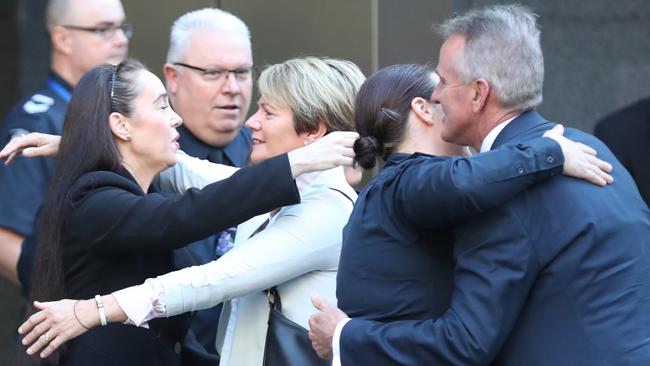 Senior Constable Kevin King’s partner, Sharron Mackenzie, arrives at court with Constable Josh Prestney’s parents, Andrew and Belinda. Picture: NCA NewsWire/David Crosling