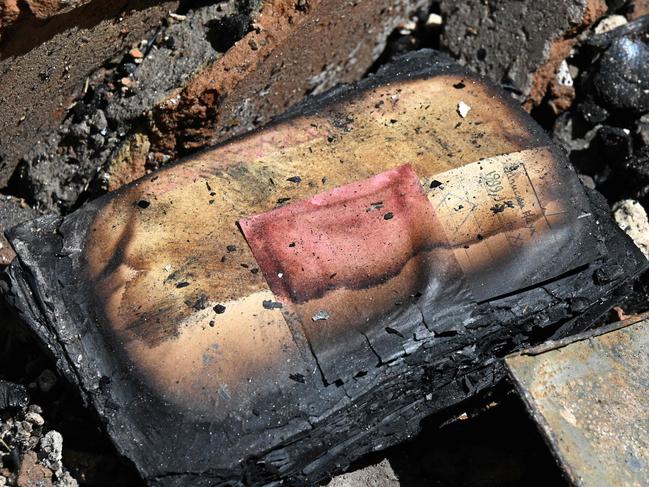 A photograph shows a charred book in the destroyed building of the Hryhoriy Skovoroda National Literary Memorial Museum in the village of Skovorodynivka. Picture: AFP