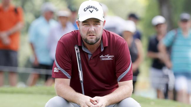 Marc Leishman powered to a share of the lead on Friday.
