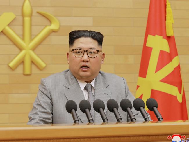 FILE - In this Jan. 1, 2018, file photo provided by the North Korean government, North Korean leader Kim Jong Un delivers his New Year's speech at an undisclosed place in North Korea. After an unusually provocative year during which North Korea tests a purported thermonuclear warhead and three intercontinental ballistic missiles, Kim tries to initiate diplomacy in his annual New Yearâ€™s address. He calls for improved relations and engagement with South Korea, though adds that he has a nuclear button on his desk. Trump responds that he has a bigger and more powerful nuclear button, 