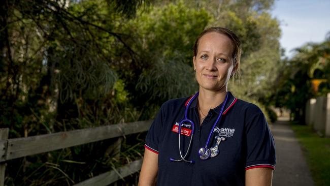 Jody Kallis is second year midwifery student at Griffith University is still going in and helping her patients, while also being a parent to her five children. Picture: Jerad Williams