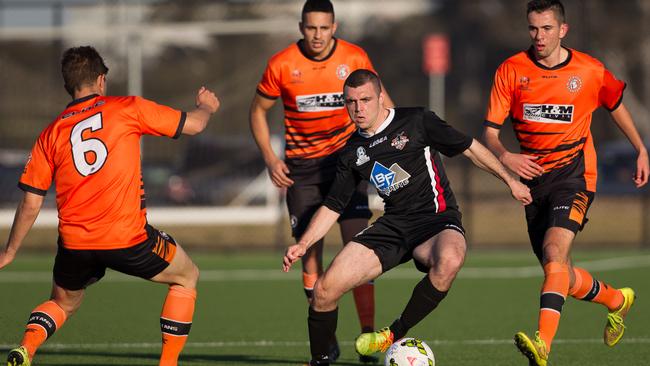 Mitchell Mallia in full flight for Blacktown City against Blacktown Spartans