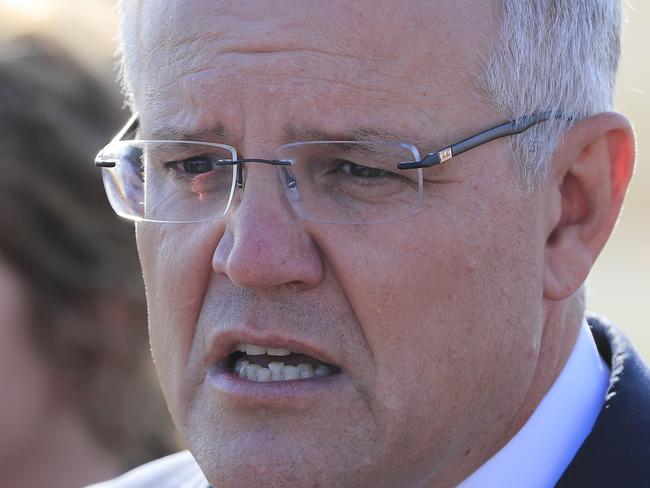 Australian Prime Minister Scott Morrison speaks to the media following the signing of the Hobart City Deal at Hobart Airport in Tasmania, Sunday, February 24, 2019. Hobart's long-awaited City Deal will be revealed as a 10-year, $1.43 billion commitment spread across tourism, science, traffic solutions and affordable housing. (AAP Image/Rob Blakers) NO ARCHIVING