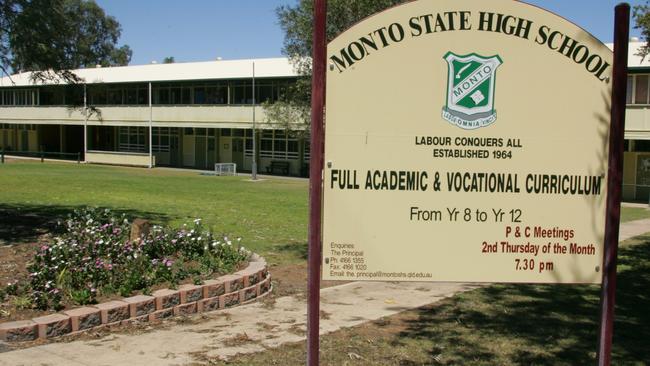 02 Oct 2004 Monto State High School sign. Students were paid by the State Govt. contractor to remove deadly asbestos materials from the school's science lab during refurbishment in Sept 2002. PicDerek/Moore education qld buildings exterior signs pollution health hazards