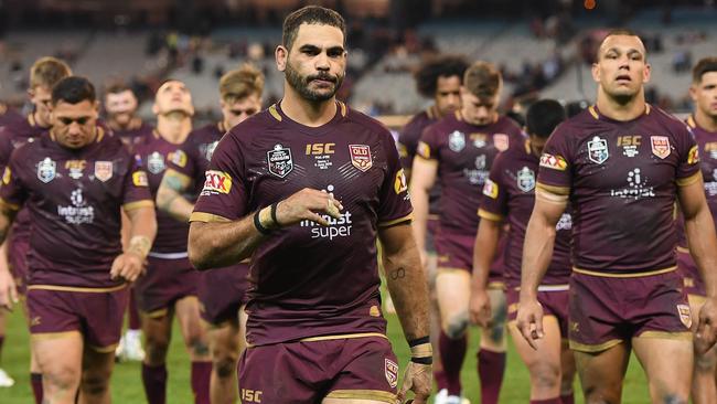 Greg Inglis leads the Maroons from the MCG.