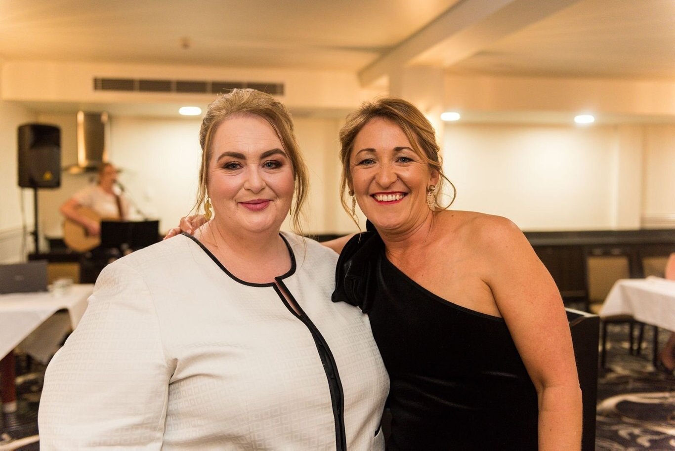 Enjoying the festivities at the Burke and Wills Hotel as part of the Protea Place Progressive Dinner in the CBD are (from left) Kim Stokes and Emily O'Sullivan.