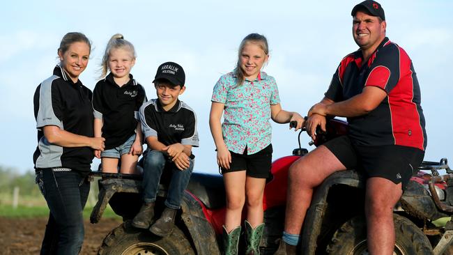 Dairy Farmers Jane and Murray Polson with their children Ruby 9, Lachlan 8 and Isabelle 4 on their property at Oxley Island on the NSW mid north coast. Picture: Nathan Edwards 