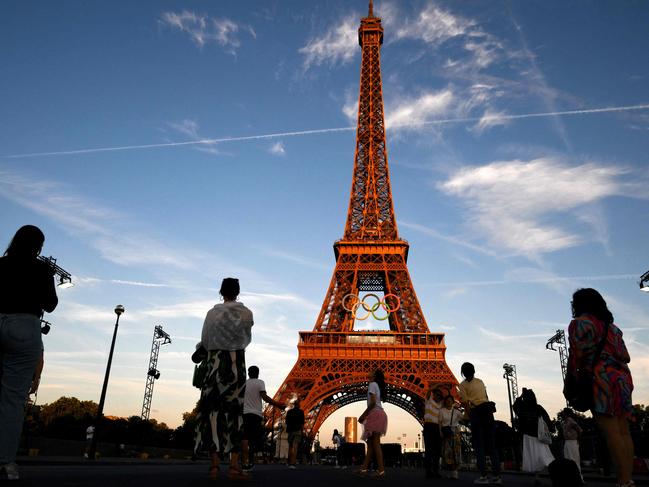 Tourists in Paris. It’s still a must-see – just a fraction more expensive than it used to be. Picture: Luis Robayo/AFP