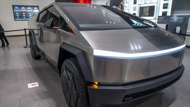 A Tesla Cybertruck at a Tesla store in San Jose, California, US, on Tuesday, Nov. 28, 2023. The first Cybertruck customers will receive the vehicles during a launch event at Tesla's Austin headquarters this week. Photographer: David Paul Morris/Bloomberg via Getty Images