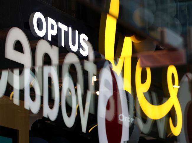 SYDNEY, AUSTRALIA - OCTOBER 05: The Optus logo and slogan are displayed outside a store on October 05, 2022 in Sydney, Australia. The identification details of 9.8 million customers of the Telecommunications operator Optus was stolen in a data breach last week, one of the largest data breaches to occur in Australia. (Photo by Brendon Thorne/Getty Images)