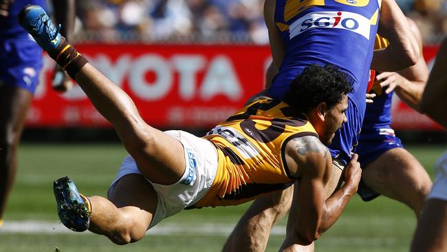 Cyril Rioli lays a flying tackle in the 2015 decider. Picture: Wayne Ludbey