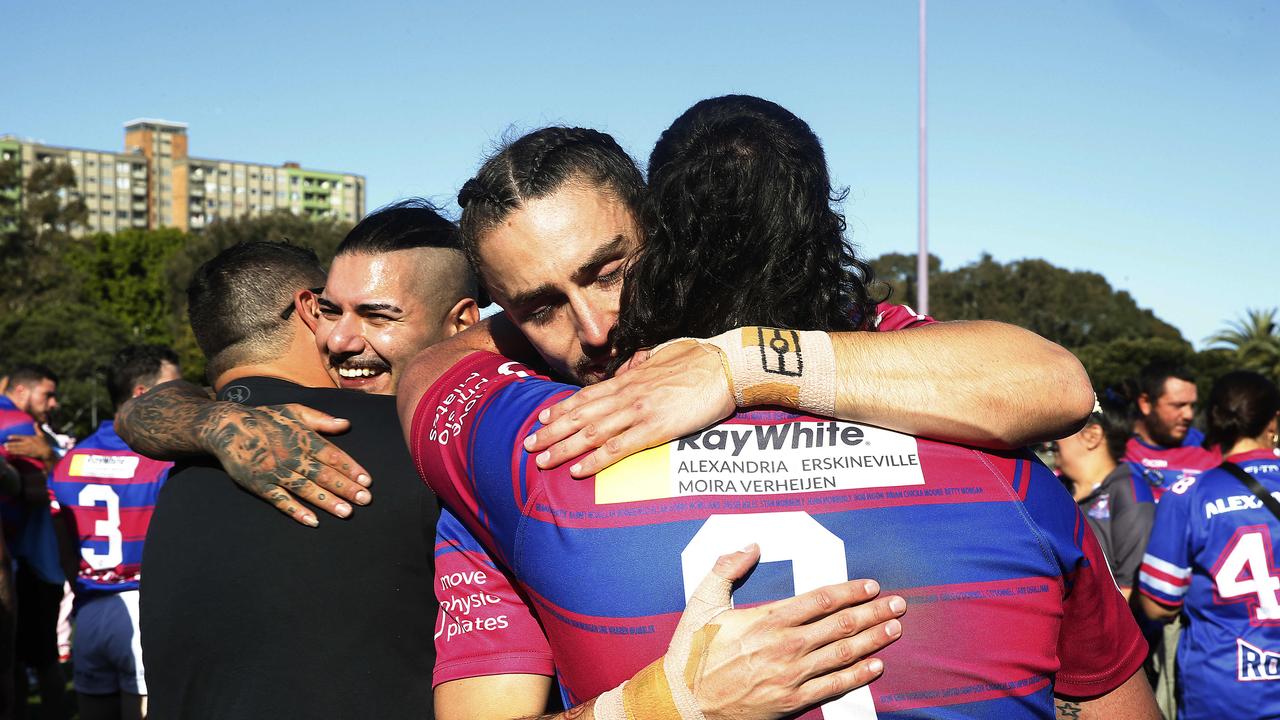 Alexandria Rovers players embrace. Picture: John Appleyard