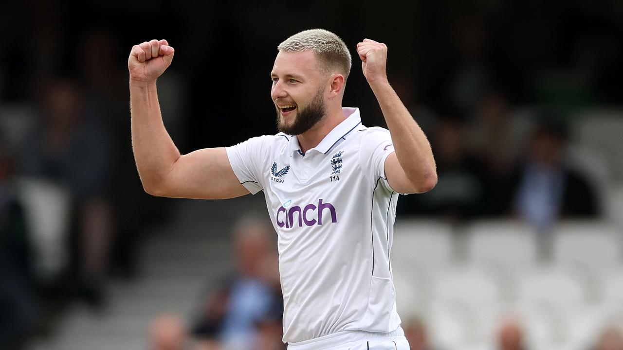 Gus Atkinson celebrates taking a wicket. (Photo by Richard Heathcote/Getty Images)