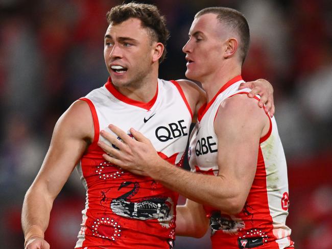MELBOURNE, AUSTRALIA - MAY 23: Will Hayward and Chad Warner of the Swans celebrate a goal during the round 11 AFL match between Western Bulldogs and Sydney Swans at Marvel Stadium, on May 23, 2024, in Melbourne, Australia. (Photo by Morgan Hancock/Getty Images)